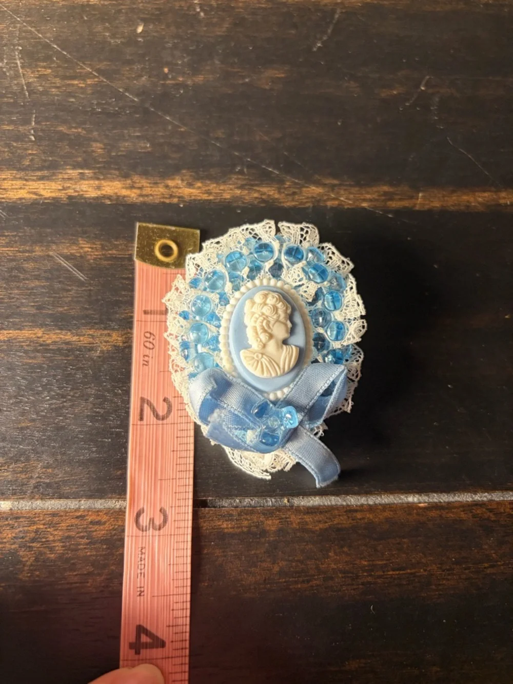 Vintage blue and white cameo brooch